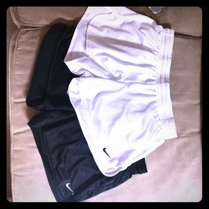 2 black and white mesh Nike shorts - size M